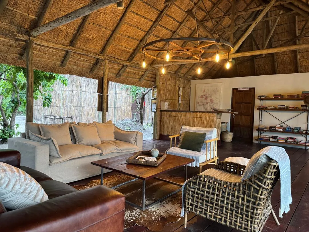 Lounge seating beneath the thatched roof