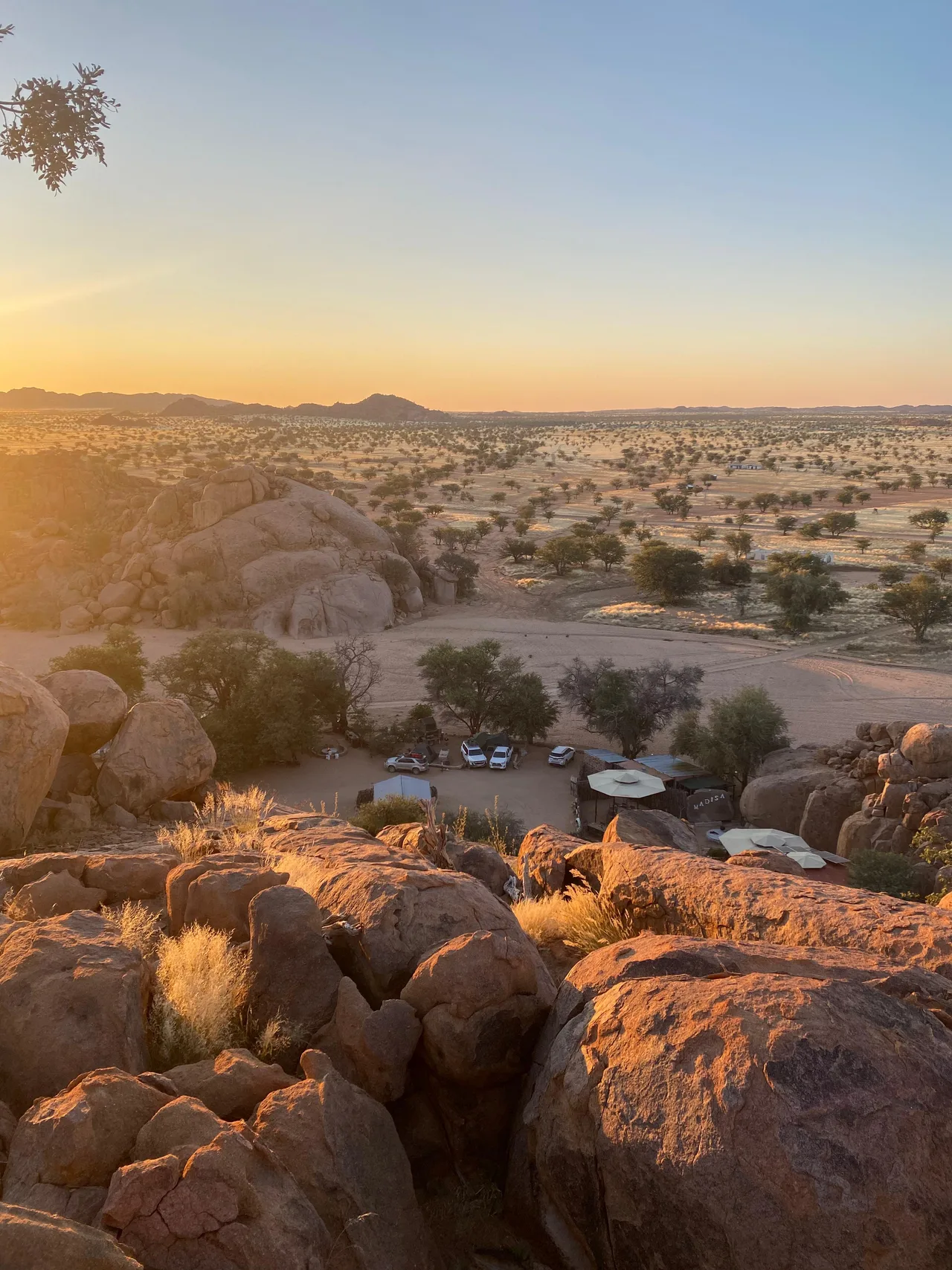 Madisa Camp among Damaraland granite at sunset